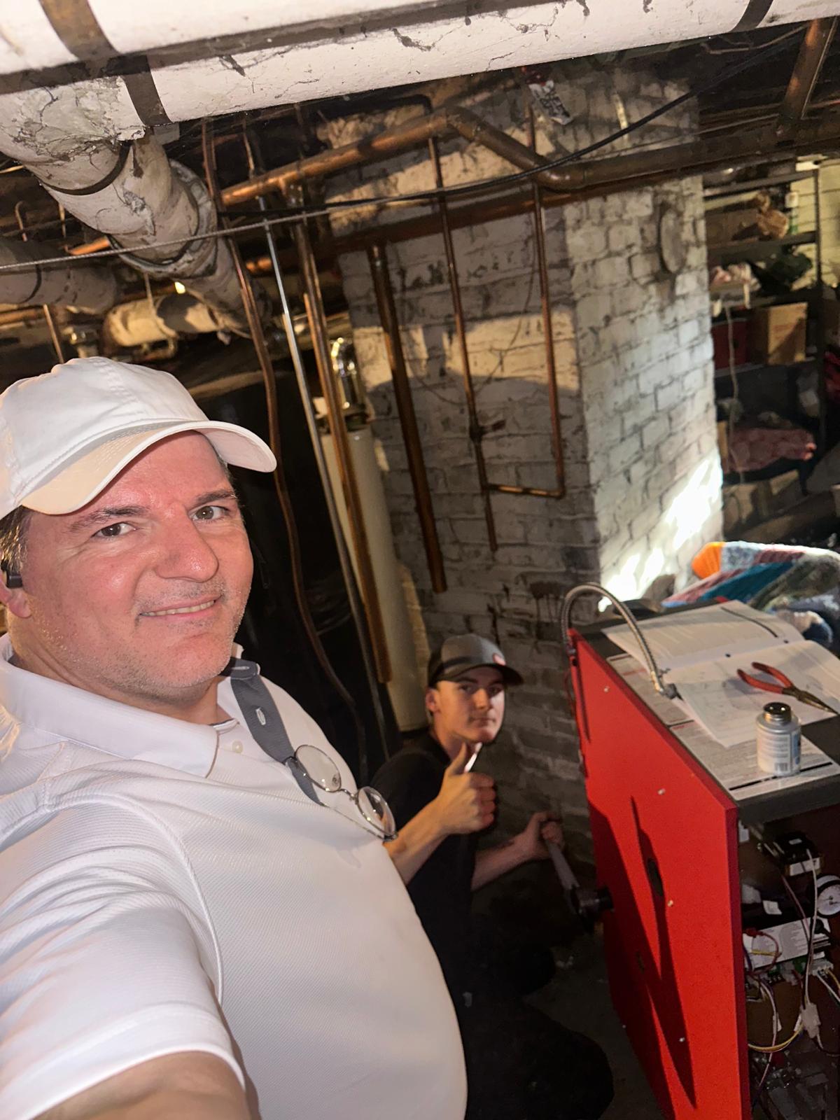 Norse technicians working in a basement.