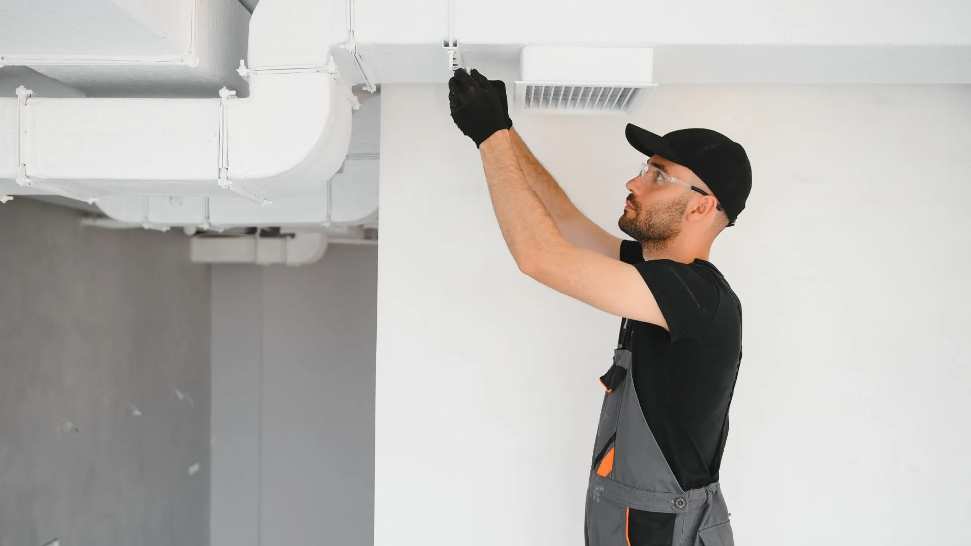 Minnesota air ducts repair technician replacing leaking ductwork