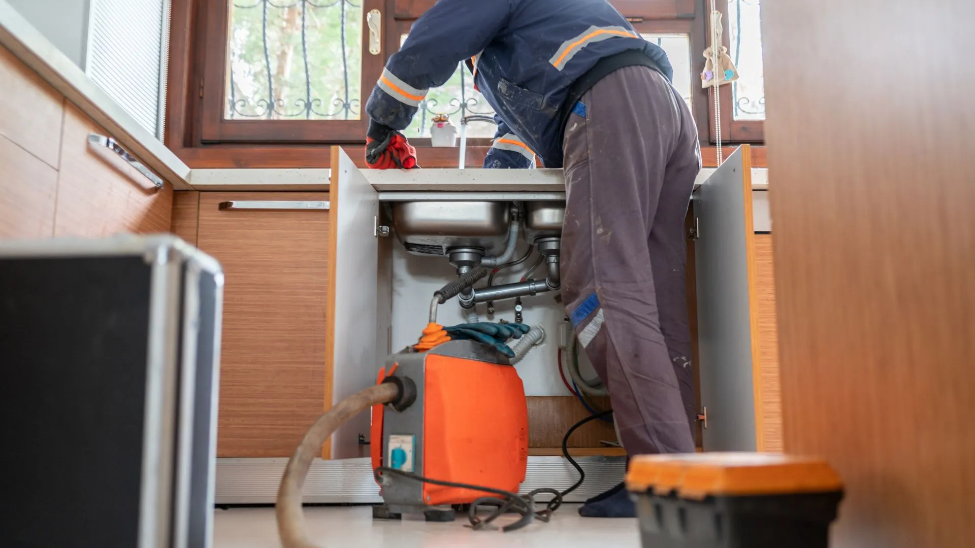Rooter services technician working as part of Minnesota drain services
