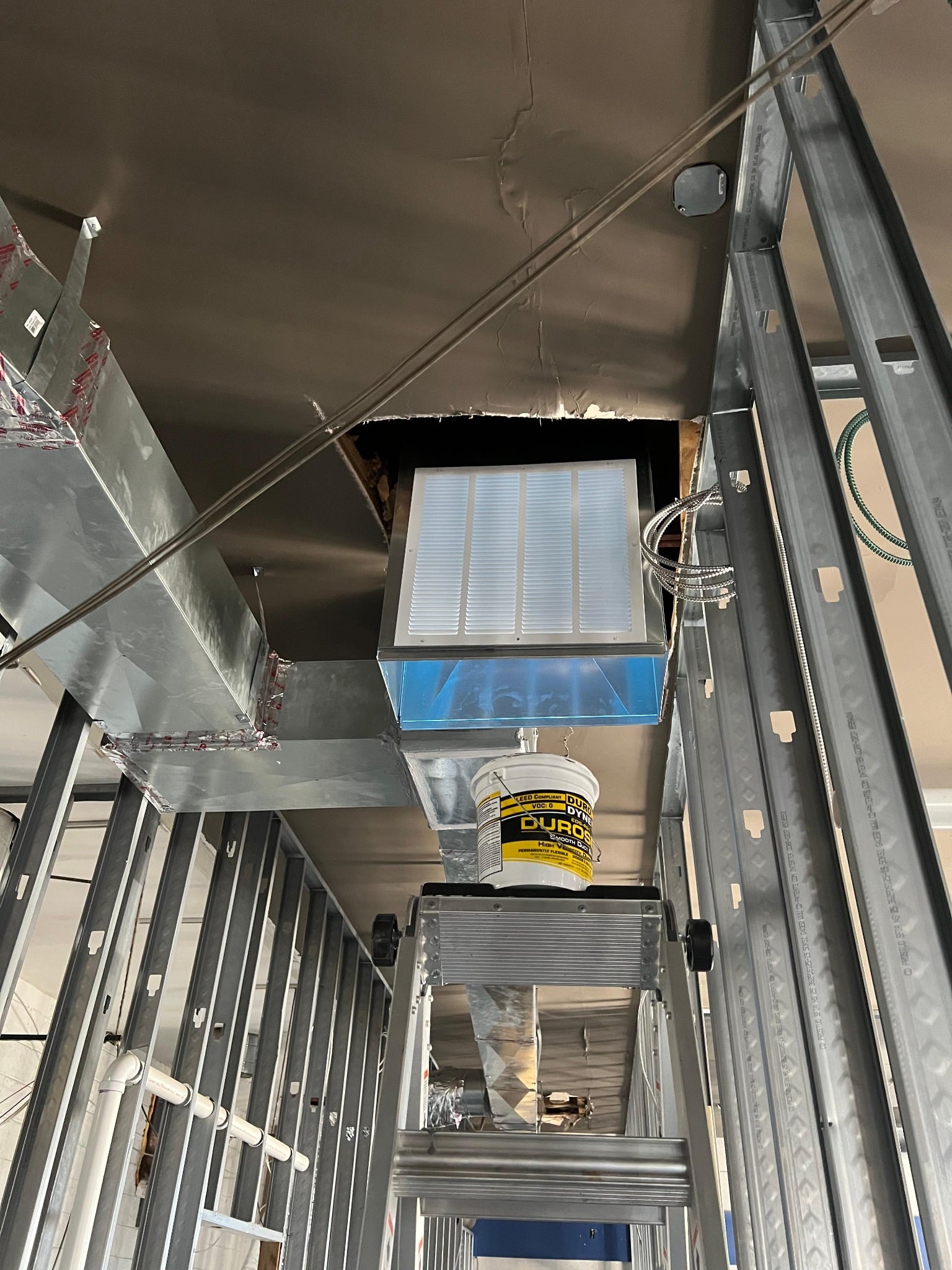 Our crew is hard at work installing custom ductwork at one of our commercial projects